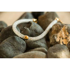 A Stainless Steel White Mesh Bracelet with Gold Oval